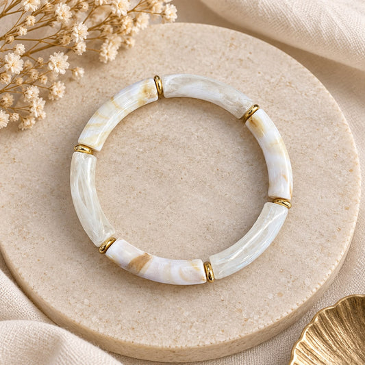Bracelet élastique perles marbrées blanc et doré